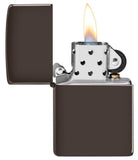 Brown windproof lighter with the lid open and lit