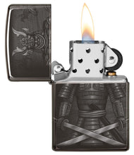 Knight Fight Design High Polish Black Windproof Lighter with its lid open and lit