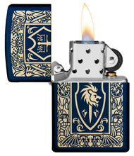 Heraldic Crest Design Windproof Lighter with its lid open and lit