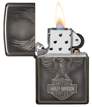 Harley-Davidson Black Ice Windproof Lighter with its lid open and lit