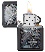 Harley-Davidson Chrome Eagle Black Matte Lighter with its lid open and lit