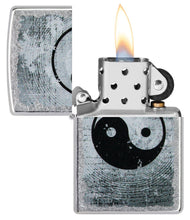 Yin Yang Design Street Chrome?äó Windproof Lighter with its lid open and lit.