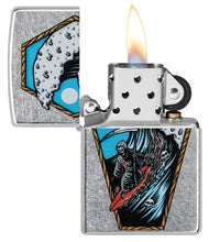 Reaper Surfer Design Street Chrome?äó Windproof Lighter with its lid open and lit.