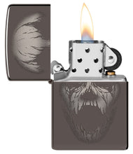 Screaming Monster Design Photo Image Black Ice?« Windproof Lighter with its lid open and lit.