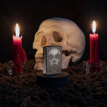 Lifestyle image of Screaming Monster Design Photo Image Black Ice?« Windproof Lighter standing with a skull and lit candles behind it.