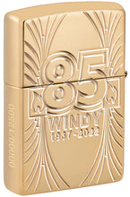 Back shot of Zippo Windy 85th Anniversary Collectible Armor High Polish Brass Windproof Lighter, standing at a 3/4 angle.