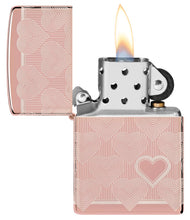 Heart Design High Polish Rose Gold Windproof Lighter with its lid open and lit.