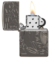 Wicca Design Armor?« Black Ice?« Windproof Lighter with its lid open and lit.