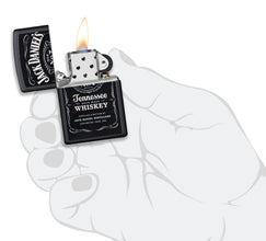 Jack Daniel's?« Texture Print Black Matte Windproof Lighter lit in hand