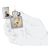 Pug Design Windproof Lighter lit in hand.