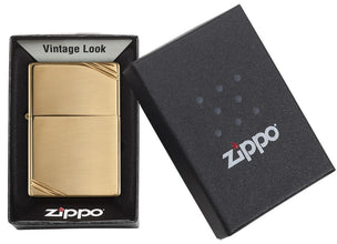 High Polish Brass Vintage with Slashes Windproof Lighter in its packaging