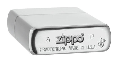 Armor® Brushed Chrome Windproof Lighter laying flat, showing the bottom stamp