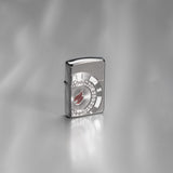 Lifestyle image of Armor® Poker Chip Design Windproof Lighter standing on a grey surface