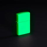 Lifestyle image of Classic Glow In The Dark Windproof Lighter, glowing in the dark