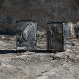 Lifestyle image of Lisa Parker Dragon design lighters, showing the front and back designs