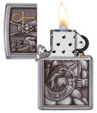 Egyptian Gods Design Street Chrome™ Windproof Lighter with its lid open and lit