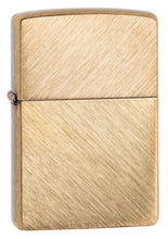 Front view of Classic Herringbone Sweep Brass Windproof Lighter standing at a 3/4 angle