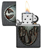 Metal Dragon Shield Design Iron Stone Lighter with its lid open and lit