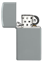 Slim?« Flat Grey Windproof Lighter with its lid open and unlit.