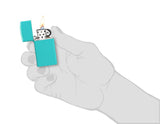 Slim® Flat Turquoise Windproof Lighter lit in hand.