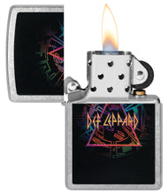 Def Leppard Design Street Chrome?äó Windproof Lighter with its lid open and lit.