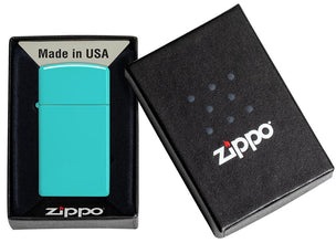 Slim?« Flat Turquoise Windproof Lighter in its packaging.