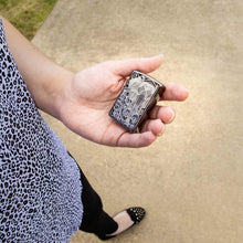 Lifestyle image of Elephant Fancy Fill Design Black Ice® being held in hand