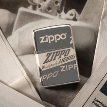 Front view of the Zippo Logo Design laying on a pile of newspaper