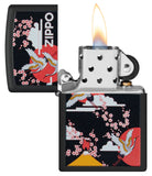 Zippo Kimono Design Black Matte Windproof Lighter with its lid open and lit.