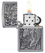 Skull and Angel Emblem Design Street Chrome?äó Windproof Lighter with its lid open and lit