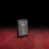 Lifestyle image of Skull Anchor Emblem Design Black Matte Windproof Lighter.
