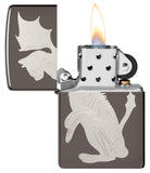 Dragon Cat Design Black Ice® Windproof Lighter with its lid open and lit.