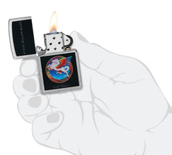 Steve Miller Band Welcome to the Vault Design Street Chrome?äó Windproof Lighter lit in hand.