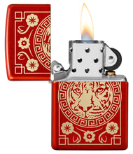 Tiger Design Metallic Red Windproof Lighter lit in hand.