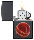 Cricket Ball Design Windproof Pocket Lighter with its lid open and lit.